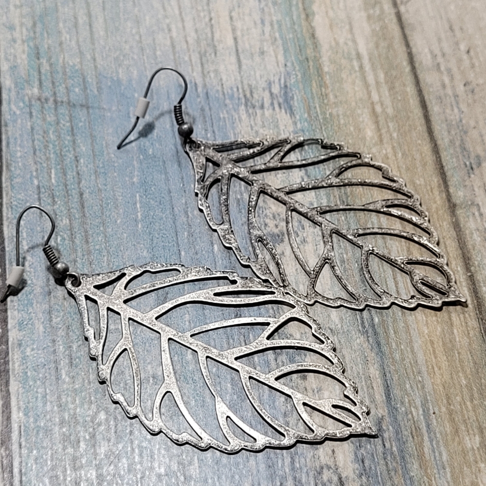 Cut out Leaf Drop Earrings. - Picture 2 of 5